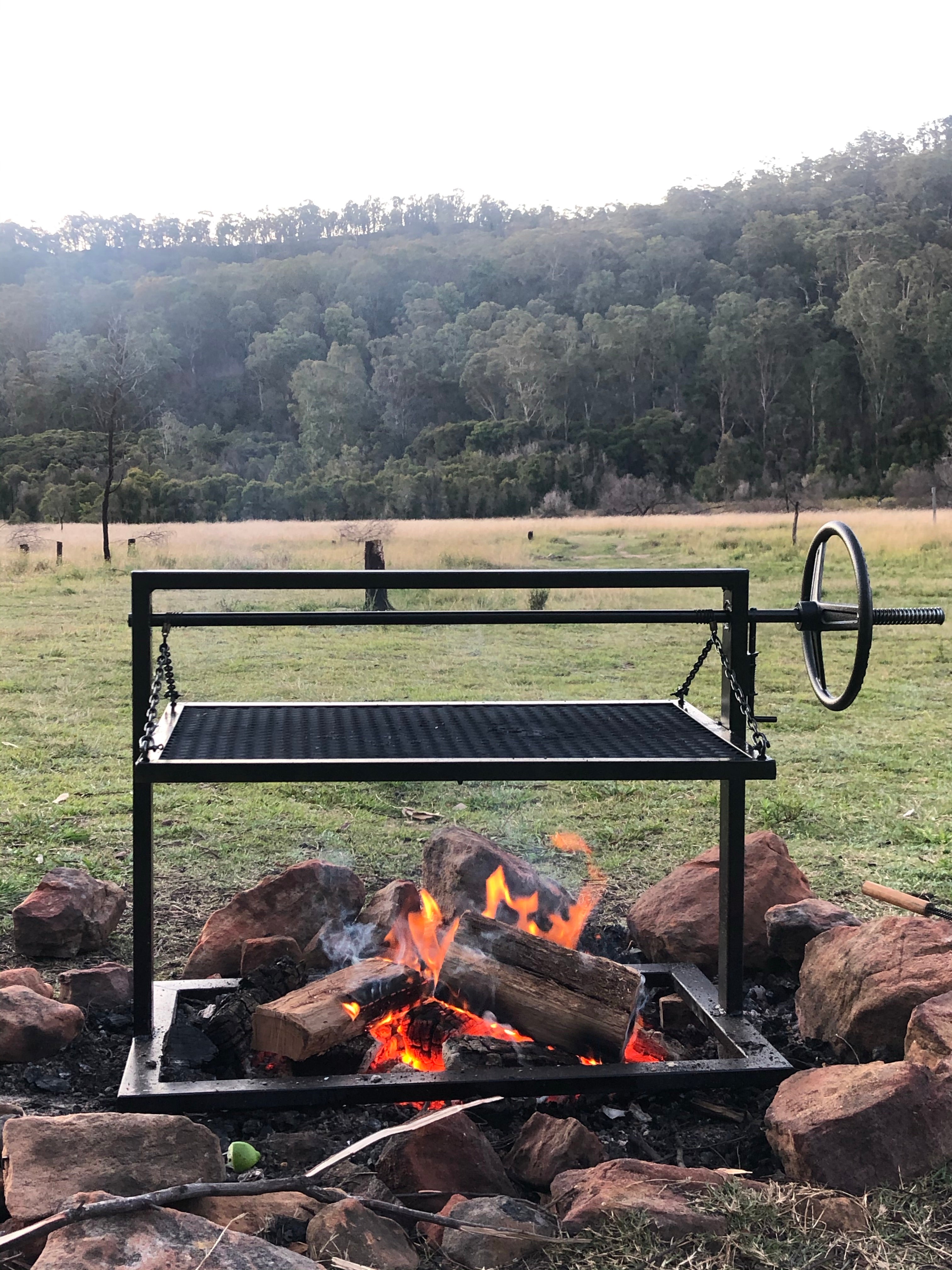 Portable charcoal parrilla BBQ perfect for fire pits and camping